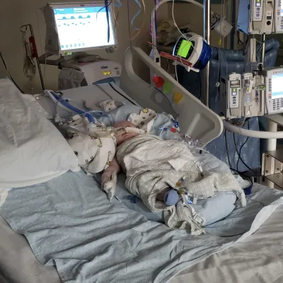 Baby in hospital bed