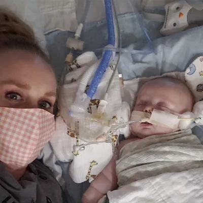 Mom at the hospital with her baby.