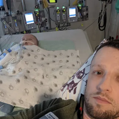 Dad at hospital with his baby