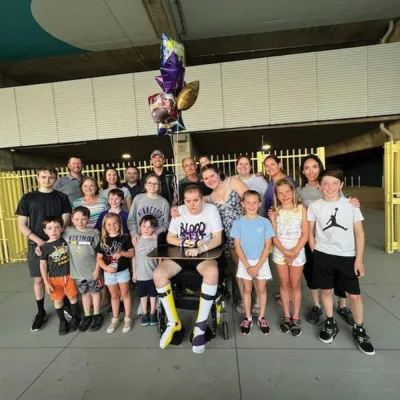 Entended family in photo when Lucas returns home.