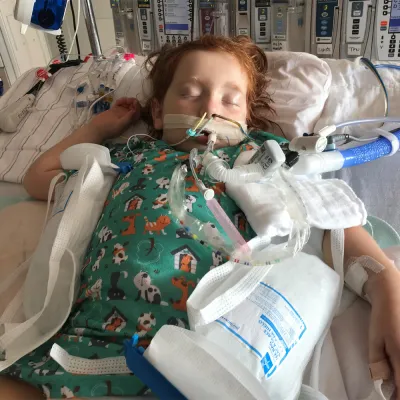 Child at the hospital in medically induced coma.