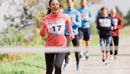 Runners approaching the finish line of a race